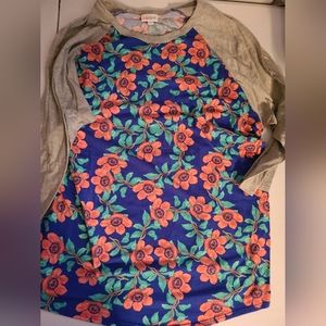 3 Lularoe Shirts. 2 Randy shirts and 1 Irma Shirt 3XL